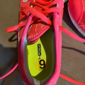 Under Armor sneakers.